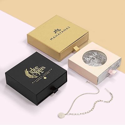 Siyah hediye çekmece ambalaj kutusu parlak laminatör bronz lekeler damgalanmış logo